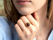 wearing garnet rose gold ring