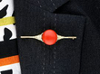 coral brooch wearing