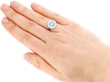 white gold blue topaz ring wearing