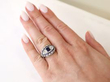 sapphire diamond platinum ring on finger