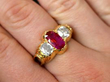 Victorian Oval Ruby and Diamond Ring on finger