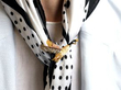 Vintage Gold Bird Brooch with Enamel on a scarf