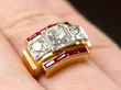 diamond and ruby ring on finger