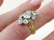 diamond cluster ring on finger