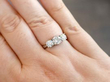wearing diamond three stone ring