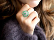 wearing emerald cocktail ring