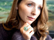 emerald cocktail ring being worn