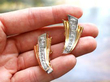 Holding Art Deco Earrings