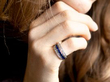 sapphire diamond ruby ring being worn