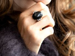 wearing onyx and diamond ring