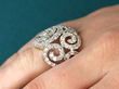 white gold diamond ring on finger