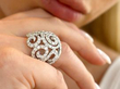 diamond cocktail ring on finger