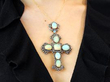 opal cross pendant wearing