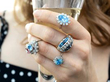 gemstone rings on hand