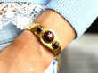 wearing garnet bangle