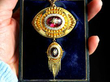 boxed garnet gold pendant