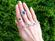sapphire rings and bracelet outside
