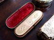 gold toothpick holder in case