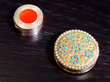 round gold boxes