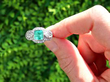 emerald and diamond platinum ring outside