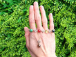 gemstone pendant and bracelet set outside