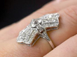 platinum diamond ring on finger