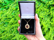 garnet and pearl pendant boxed outside