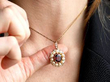 wearing garnet pearl pendant