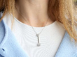 wearing diamond pendant