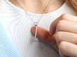 diamond pendant being worn