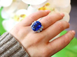 sapphire cocktail ring on hand