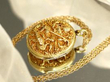 large gold locket