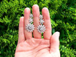 diamond flower drop earrings outside