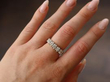 diamond eternity ring on finger