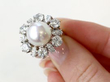 Diamond and Pearl Cluster Ring on finger