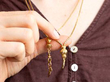 gold chain necklace wearing