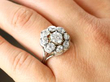 cluster diamond ring on finger
