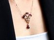 garnet moonstone pendant being worn