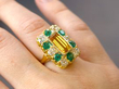 wearing topaz and emerald ring