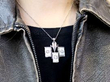 wearing an Art Deco pendant