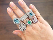 gemstone rings on hand