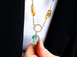 wearing citrine quartz diamond necklace