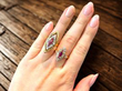 wearing ruby and diamond rings