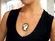 wearing antique cameo yellow gold pendant