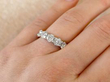 white gold diamond eternity ring on finger