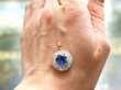 Holding Sapphire Cluster Pendant
