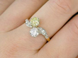 yellow diamond twist ring on finger