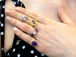 gemstone rings on hand