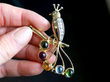 gemstone bird brooch