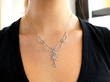 wearing aquamarine pearl necklace